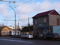 Astrakhan, Kurmangazi st, house 2. Apartment house with a store on the ground-floor