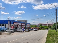 Новосибирск, улица Курчатова, дом 30. многофункциональное здание Автоцентр