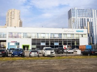 Калининский район, улица Ушинского, дом 12 с.1. многофункциональное здание