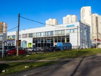 соседний дом: ул. Ушинского, дом 12 с.1. многофункциональное здание