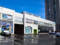 Калининский район, улица Ушинского, дом 12 с.1. многофункциональное здание