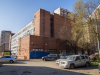 соседний дом: ул. Учительская, дом 23. Бизнес-центр "Атолл"